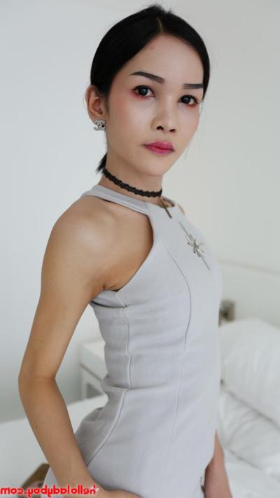 20P Cute Asian shemale Mickey flashes her panties while posing in her hot outfit
