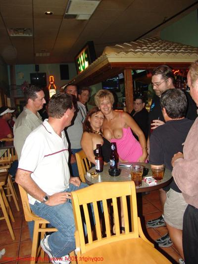20P Slutty mature wives go wild and show off their big boobs at the bar