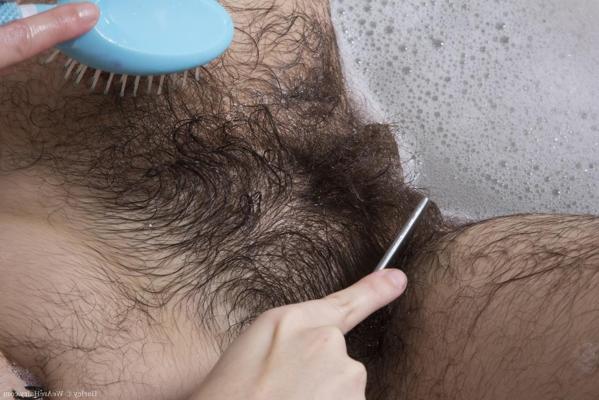 15P Hirsute woman Harley combs her wet underarms and legs in the bathtub