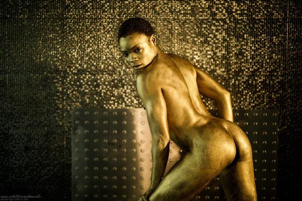 15P Ebony chick Ana Foxxx models for a nude solo shoot in a confident manner