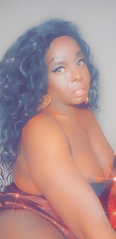 14P Beautiful ebony shemale Chanel unveils her big tits & BBC in a solo