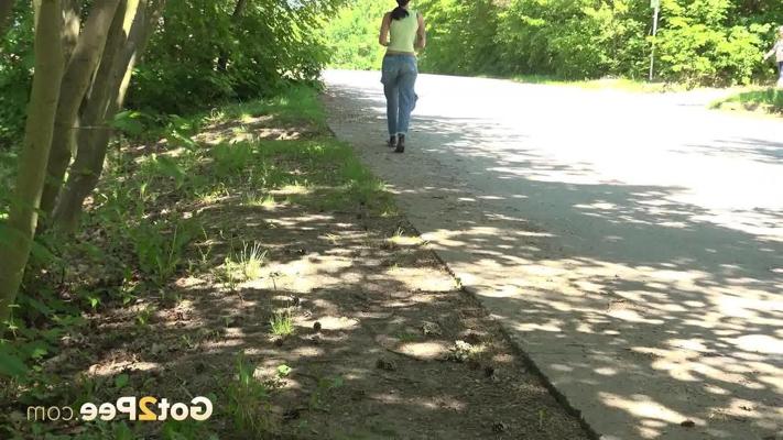 14P Brunette MILF Ali Bordeaux pulls down ripped jeans to piss next to a road
