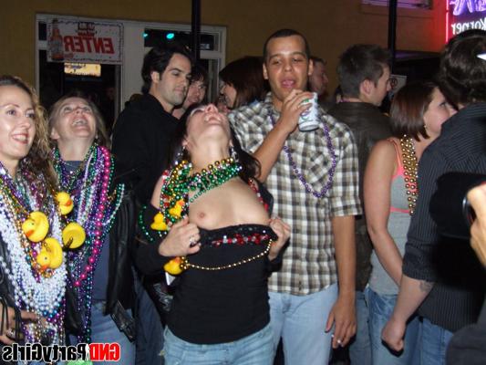 12P Inebriated girls expose their breasts during an outdoor gathering
