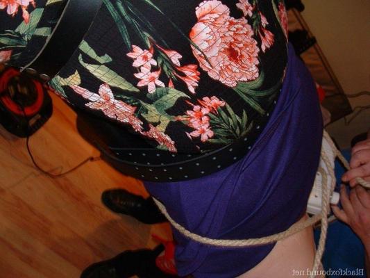 16P Overweight redhead is restrained with rope and chain while silenced with tape