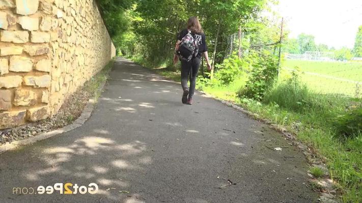 14P Pretty girl Aleya pulls down her pants to piss on a paved roadway