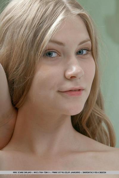 18P 18 year old Kessie A releasing small pointy breasts for solo girl spread