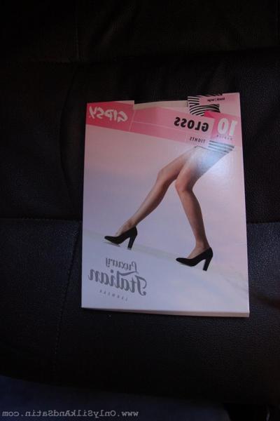 20P Dark haired model Sabrina C shows her small breasts and long legs in pantyhose