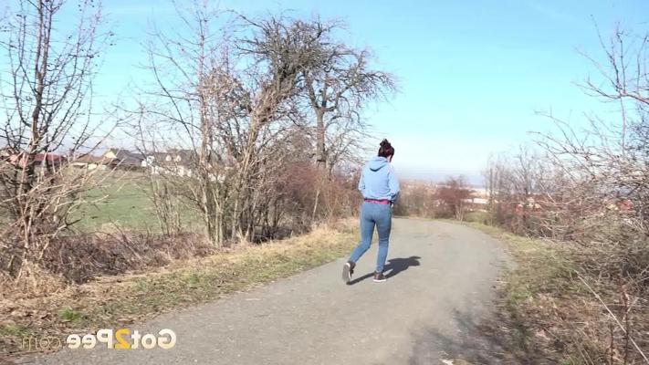15P Natural redhead Antonia Sainz takes a pee on a road in the countryside