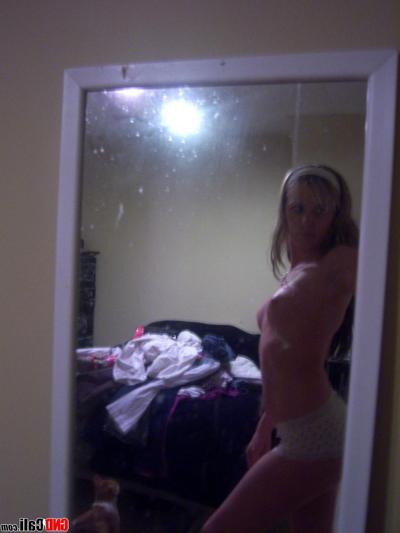12P Blonde teen takes selfies while going topless in front of a mirror
