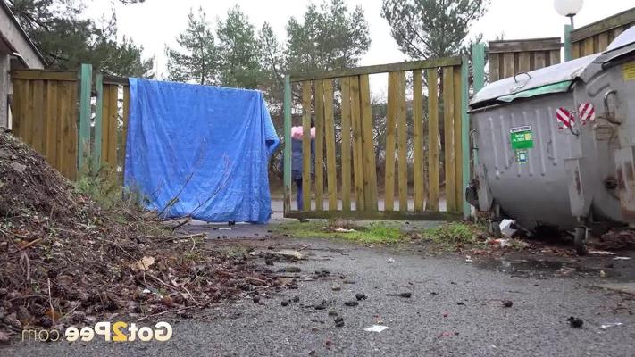 15P Dafne takes a badly needed piss in front of a dumpster on a chilly day