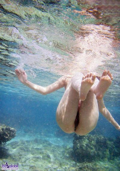16P Japanese model Nao Yoshizaki goes skinny dipping while hanging at the beach