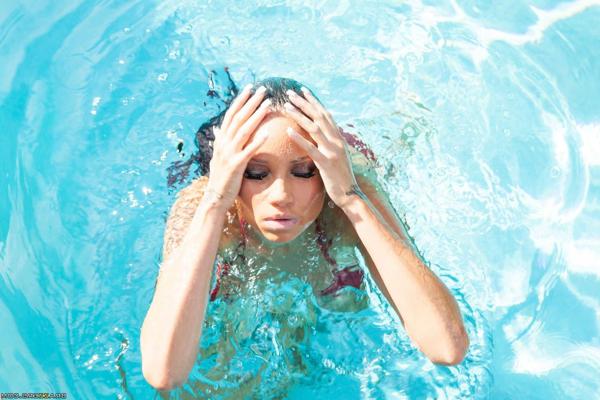 17P Skinny tattooed babe Raven Bay masturbates by the swimming pool