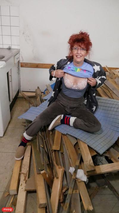 14P Redheaded granny with small tits takes a fat dick in her kitchen