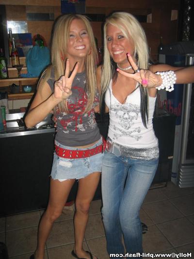 11P Amateur girls fool around with their clothes on in candid action