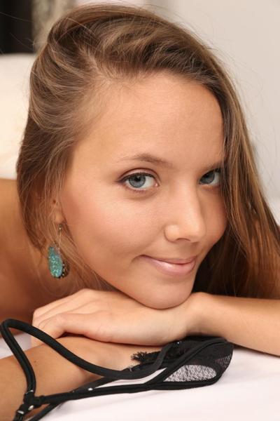 20P Sweet teen Mango A removes a black bra and thong to pose totally naked