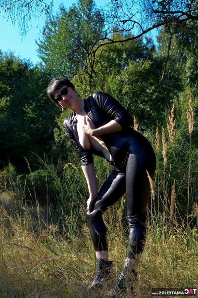 16P Brunette amateur Hot MILF unzips a catsuit to show her natural tits