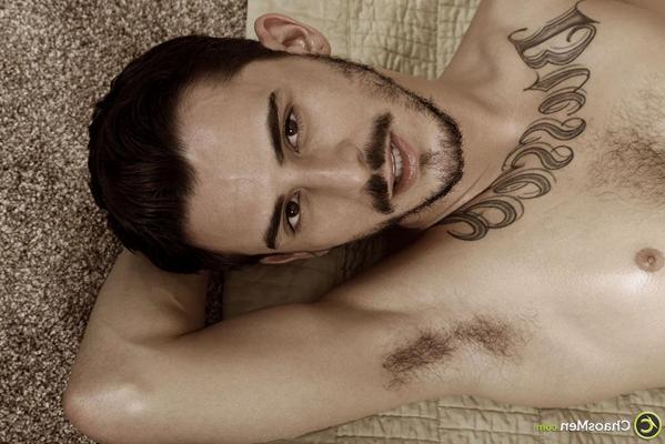 20P Inked gay brunette Devin Dixon receives a hot BJ while bound and blindfolded