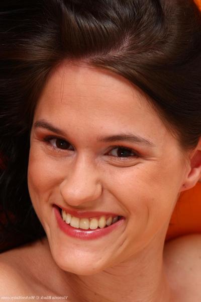 17P Brunette with large breasts and pierced clit Victoria Black shows off her bush