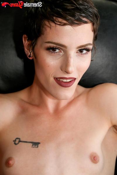 16P Short-haired shemale Carrie Emberlyn shows off her big ass before jerking off