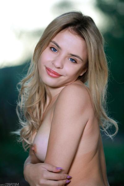 20P Angelic blonde babe Monika Jelolt shows off her big ass & her delicious pussy