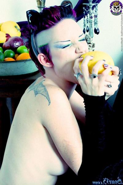 15P Alt girl Scar 13 bites into an in orange and a lemon while totally naked