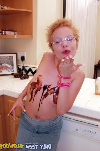 20P Naughty redhead Emily Davinci goes topless & indulges in a food play solo