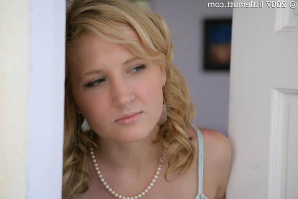 16P Blonde teen Kimber Clarkson hangs onto her cat before showing her tight slit