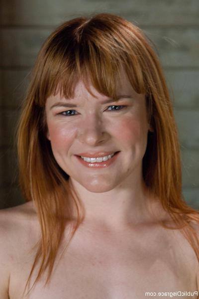 20P Redheaded mature Claire Robbins shows her hot ass and small tits in a solo