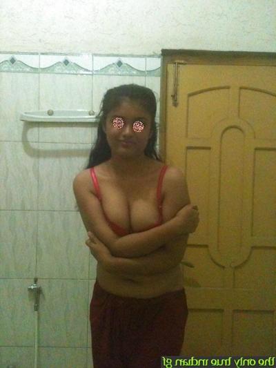 10P Indian college girl shows her big natural tits while in a bathroom