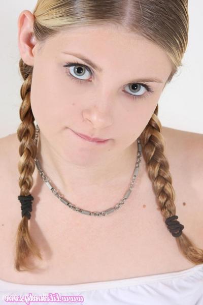17P Pigtailed cutie Lil Candy spreading her yummy pink pussy on the bed