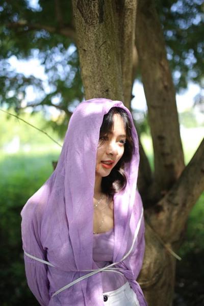 20P Asian seductress Nhatle posing in her amazing Halloween costume outdoors