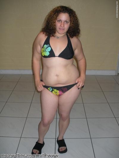 15P Fat woman with pierced nipples toys her bald twat before donning a bikini