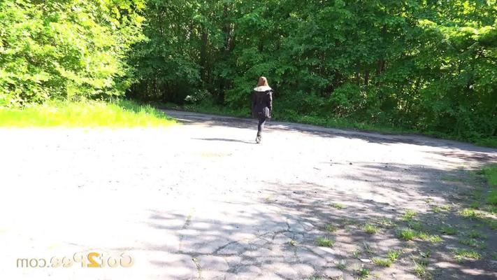15P Caucasian female Cynthia Vellons takes a piss on a paved road in suede boots