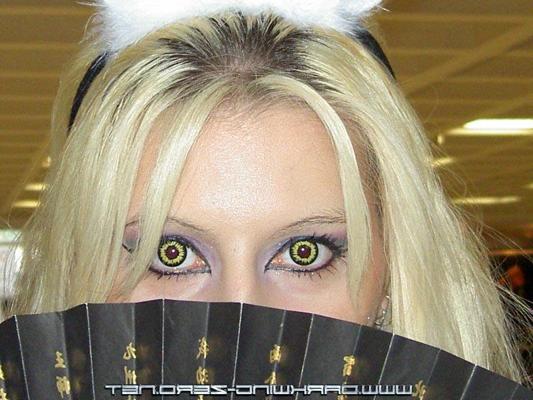 16P Blonde chick wears fetish clothing while attending Ani Con