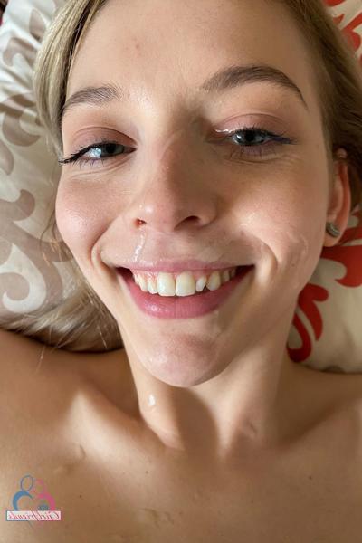 20P Cute amateur girlfriend Lily Larimar displays her shaved cunt on a bed