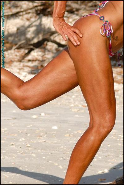 15P Blonde bodybuilder Denise James changes into a bikini before going outdoors