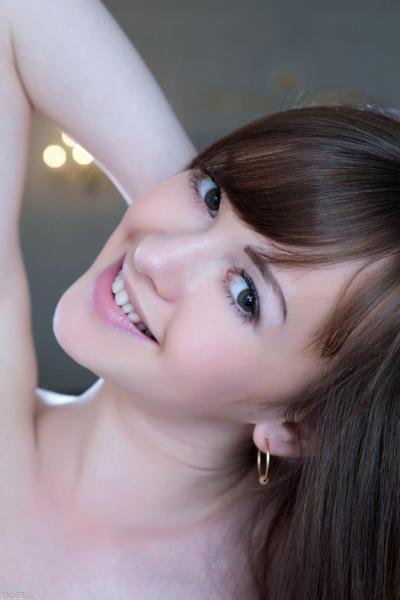 20P Sweet brunette teen Nastya E shows off her hot body and poses naked