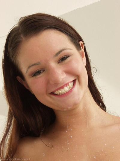 20P Brunette teen Jana Mrazkova gets her clothes wet and masturbates with milk