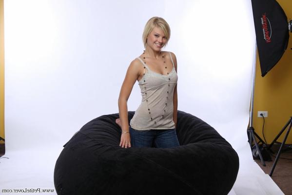 16P Blonde amateur models non nude on a bean bag chair in blue jeans