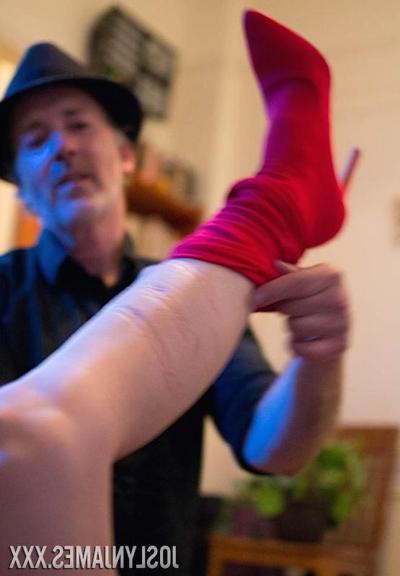 17P Tattooed chick Joslyn James is tied up with rope while wearing red boots