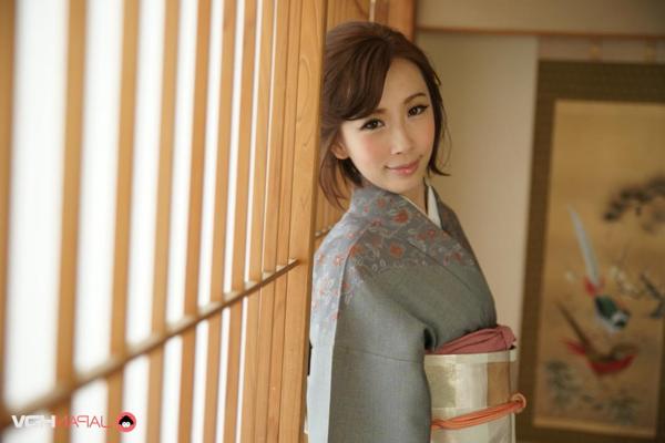 15P Japanese beauty Aya Kisaki models traditional clothing during a solo shoot
