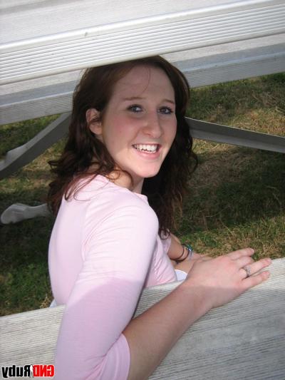 12P Natural redhead flashes her upskirt panties on a bleacher at a ballpark
