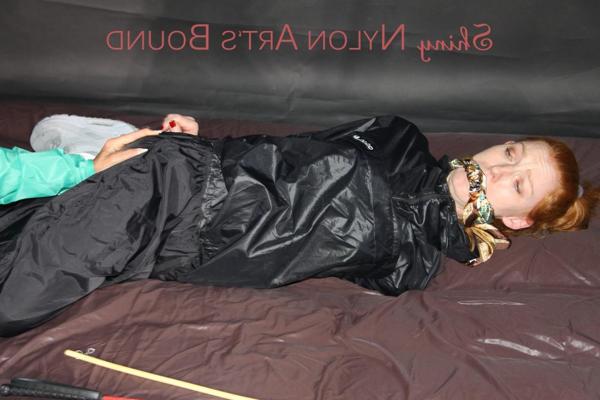 16P Natural redhead is left tied up and gagged by a fully clothed dyke