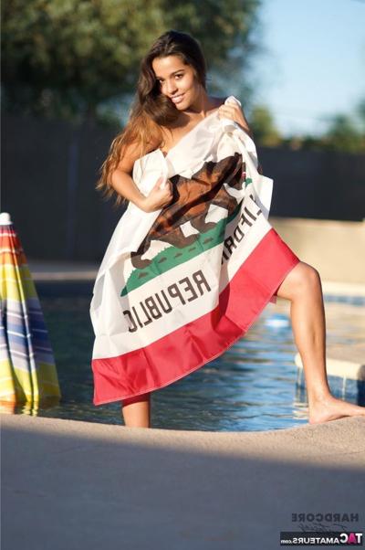 16P Hot girl Heavenly Smut models a bikini in high heels near a swimming pool