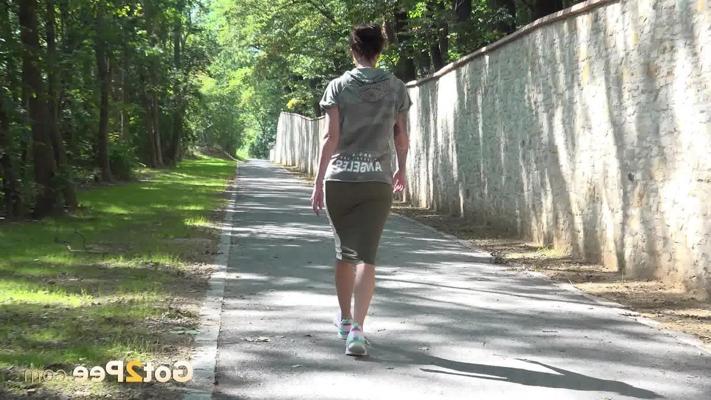 15P Solo girl Ali Bordeaux hikes up her skirt to pee on a paved roadway