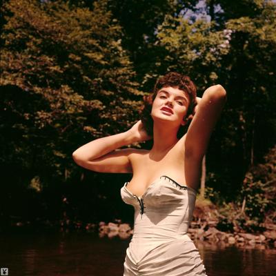 16P Sweet looking retro model Zahra Norbo bares her natural tits in the lake