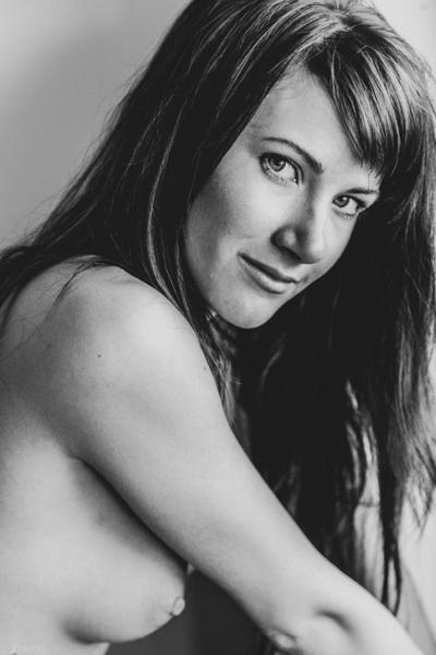 20P Gorgeous brunette Lauren Crist undressing and fingering herself