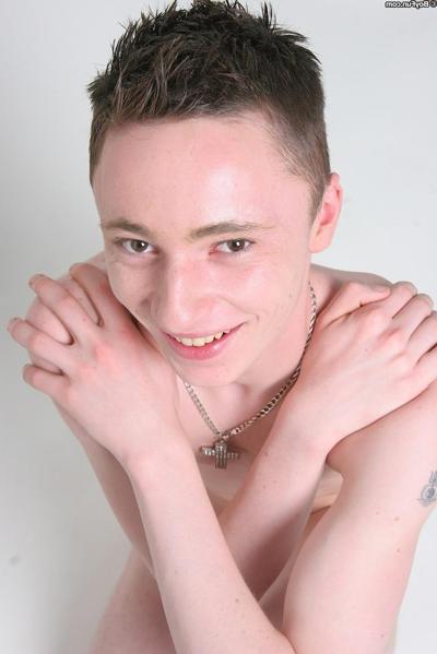 20P Sexy Caucasian gay boy Ryan Lancaster strips naked & tugs his big uncut dick