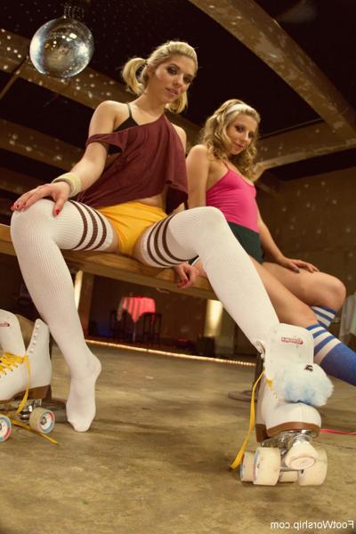 17P White girls in roller skates and striped socks expose their small tits