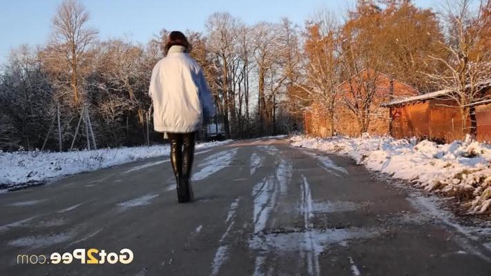 15P Asian girl Pinkycat squats for a piss on frozen ground near a brick wall